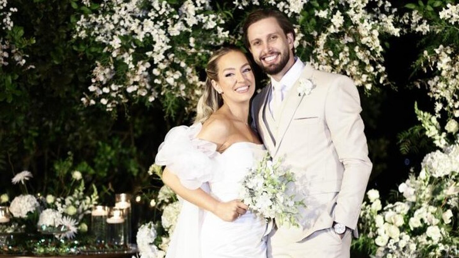 Um casal que exala alegria e felicidade. Foto: Evelin Giovanoni.